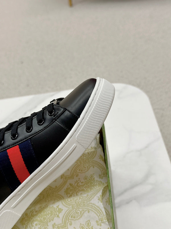 Side profile of Gucci tonal black sneakers chunky sole construction