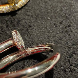 Side view of Cartier unisex jewelry piece