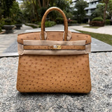 Side view of modern structured handbag