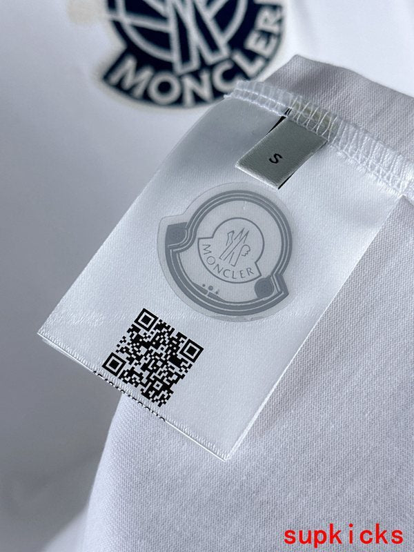 Front view of Moncler luxury clothing with signature branding