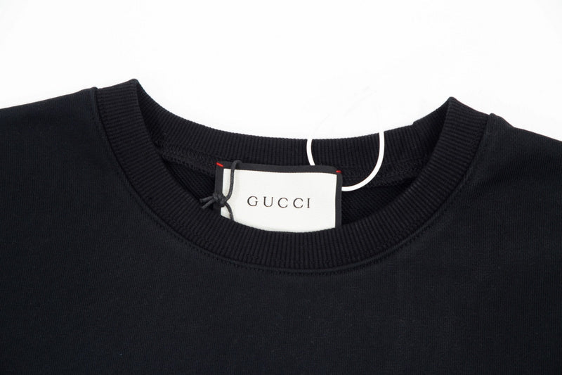 Close-up detail shot of Gucci luxury clothing with contemporary cut