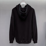 Side profile of Gucci luxury clothing with monogram-inspired silhouette