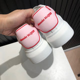 Alexander McQueen crisp white luxury sneakers view 11 everyday casual design