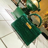 Side view of clean-lined structured handbag