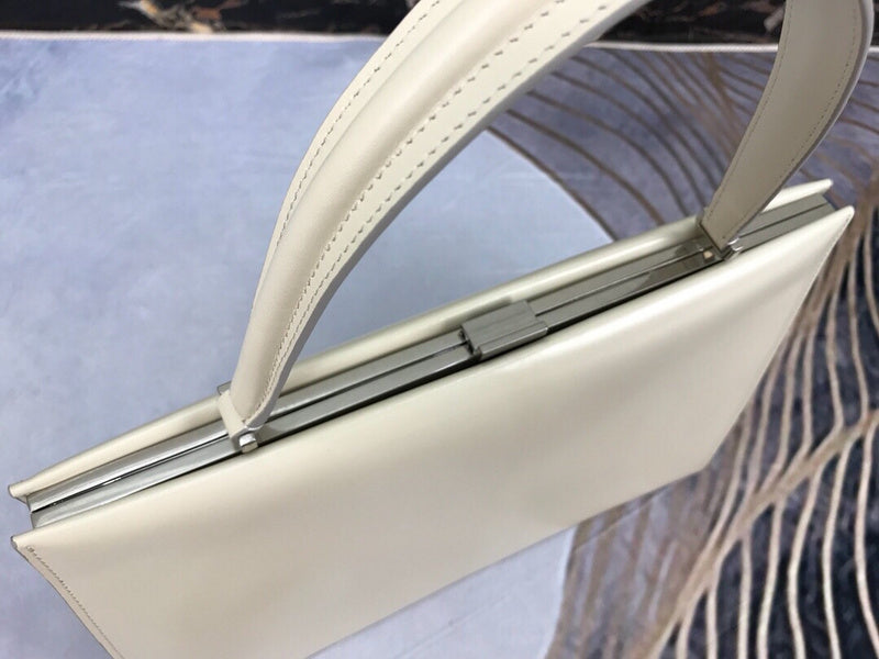 Side profile of refined classic women's handbag – women's everyday handbag