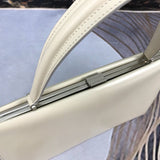 Side profile of refined classic women's handbag – women's everyday handbag