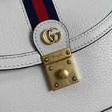 Styled lifestyle shot of classic everyday-luxe women's handbag – women's statement bag