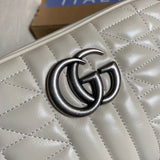 Handle and strap detail of polished elevated women's handbag – women's statement bag