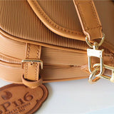  crossbody bag close-up of hardware and finish