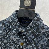 Full styled look of Louis Vuitton luxury clothing with label-forward styling