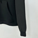 Front view of Louis Vuitton luxury clothing with label-forward styling