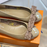Louis Vuitton Red Slip-On Sneakers - Sole Detail View