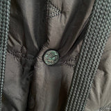 Front view of Louis Vuitton luxury clothing with contemporary cut