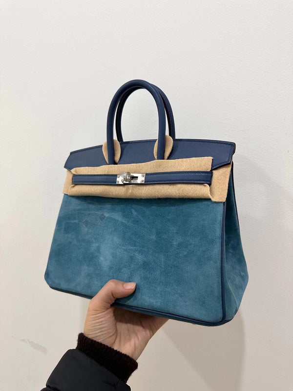 Side view of classic structured handbag