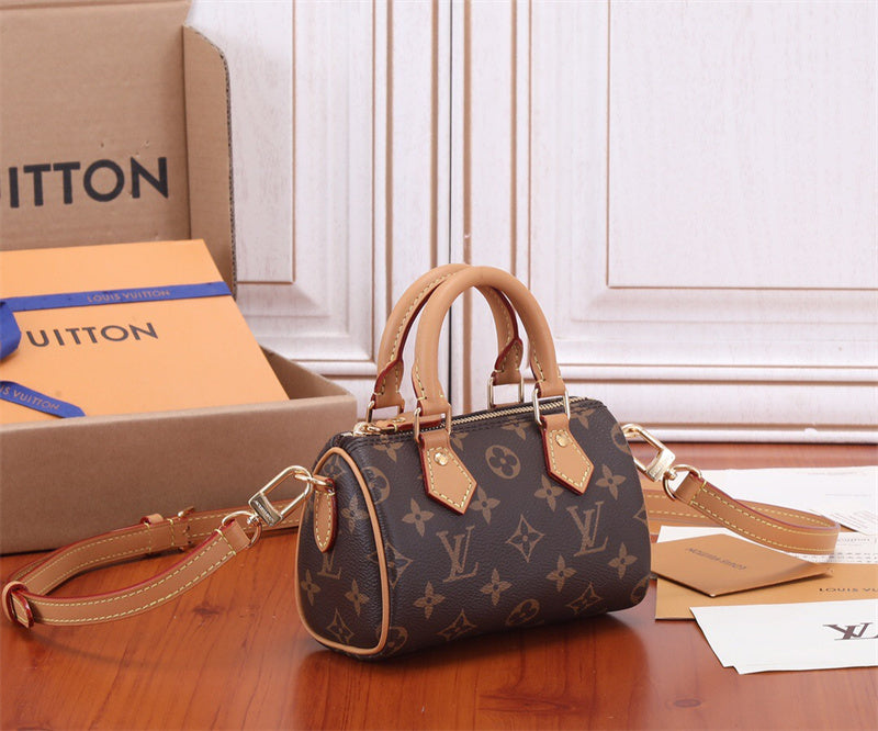 Signature tote bag carried on shoulder