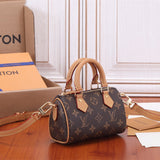  Signature tote bag carried on shoulder