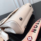 Close-up detail of sleek elevated women's handbag – women's luxury accessory