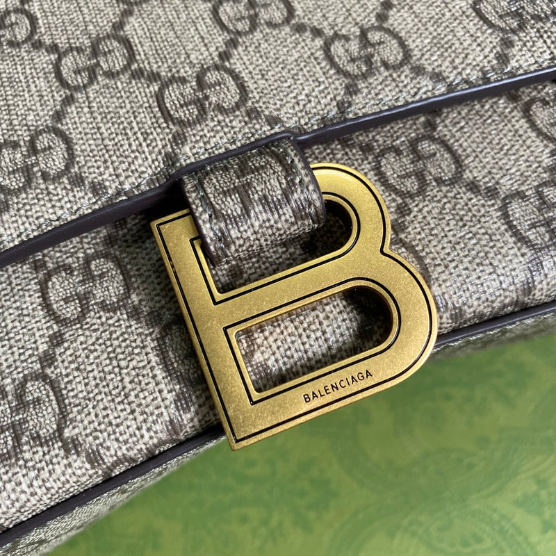Styled lifestyle shot of structured classic women's handbag – women's luxury accessory