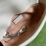 Handle and strap detail of refined classic women's handbag – women's statement bag