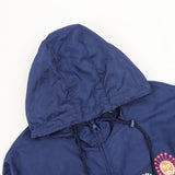 Close-up detail shot of Louis Vuitton luxury clothing with monogram-inspired silhouette