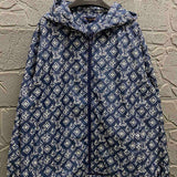 Back view of Louis Vuitton luxury clothing with everyday silhouette