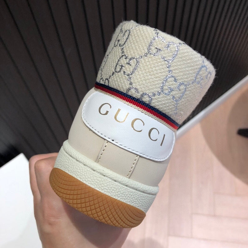 Side profile of Gucci stone beige sneakers padded collar comfort