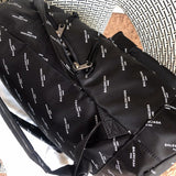 Styled lifestyle shot of polished structured women's handbag – women's designer-style accessory