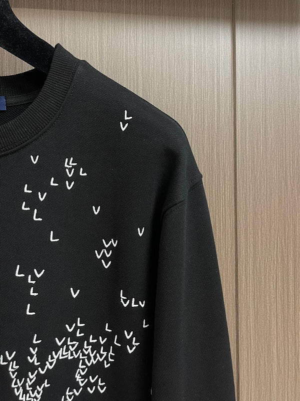 Full styled look of Louis Vuitton luxury clothing with tailored silhouette