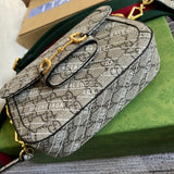 Styled lifestyle shot of classic signature women's handbag – women's designer-style accessory