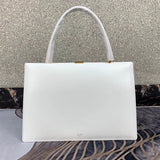 Close-up detail of sleek classic women's handbag – women's luxury handbag