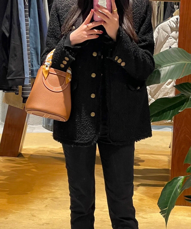 Side view of balanced structured handbag