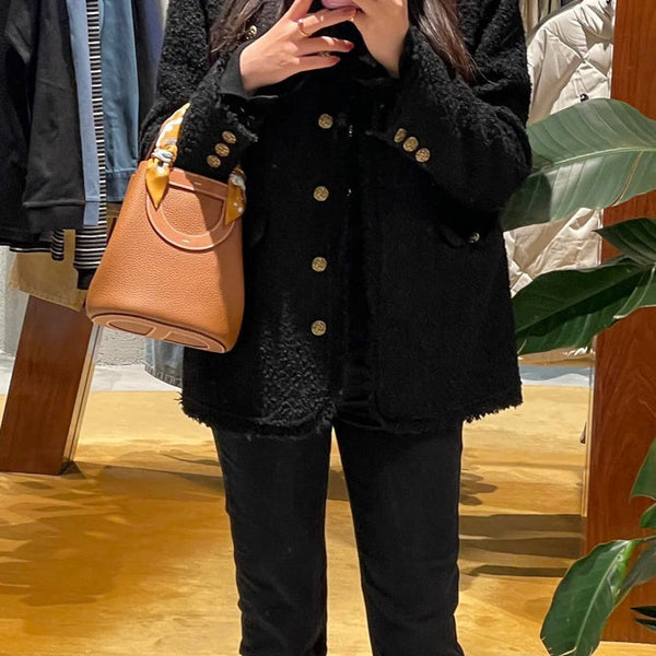 Side view of balanced structured handbag