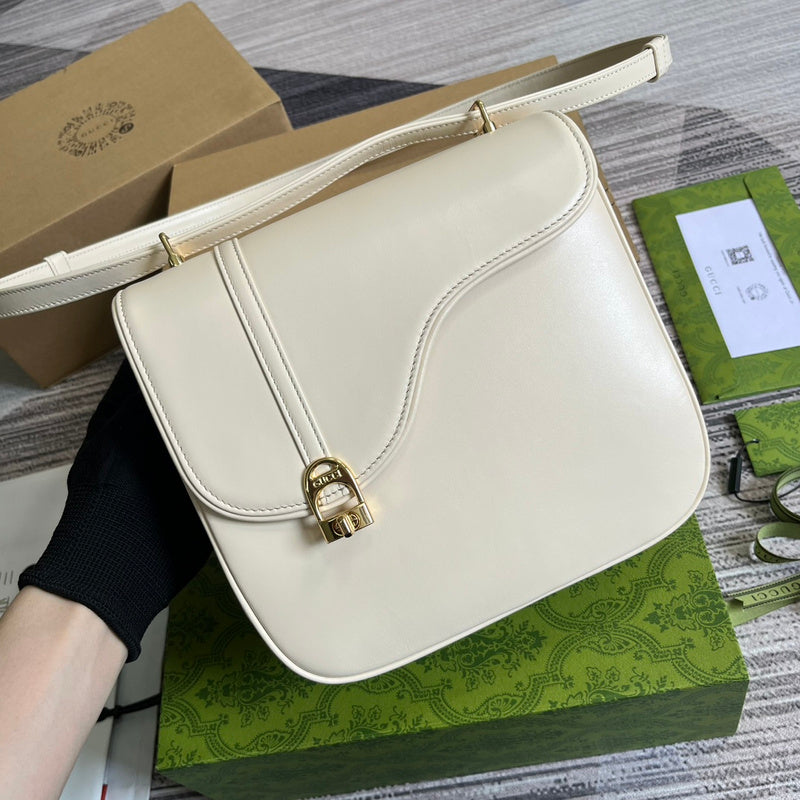 Handle and strap detail of classic elevated women's handbag – women's luxury handbag