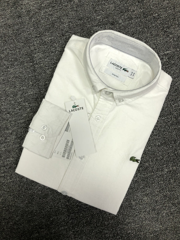 Close-up detail shot of Lacoste luxury clothing with logo-detail design