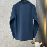 Side profile of Louis Vuitton luxury clothing with logo-detail design