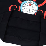Front view of Gucci luxury clothing with everyday silhouette