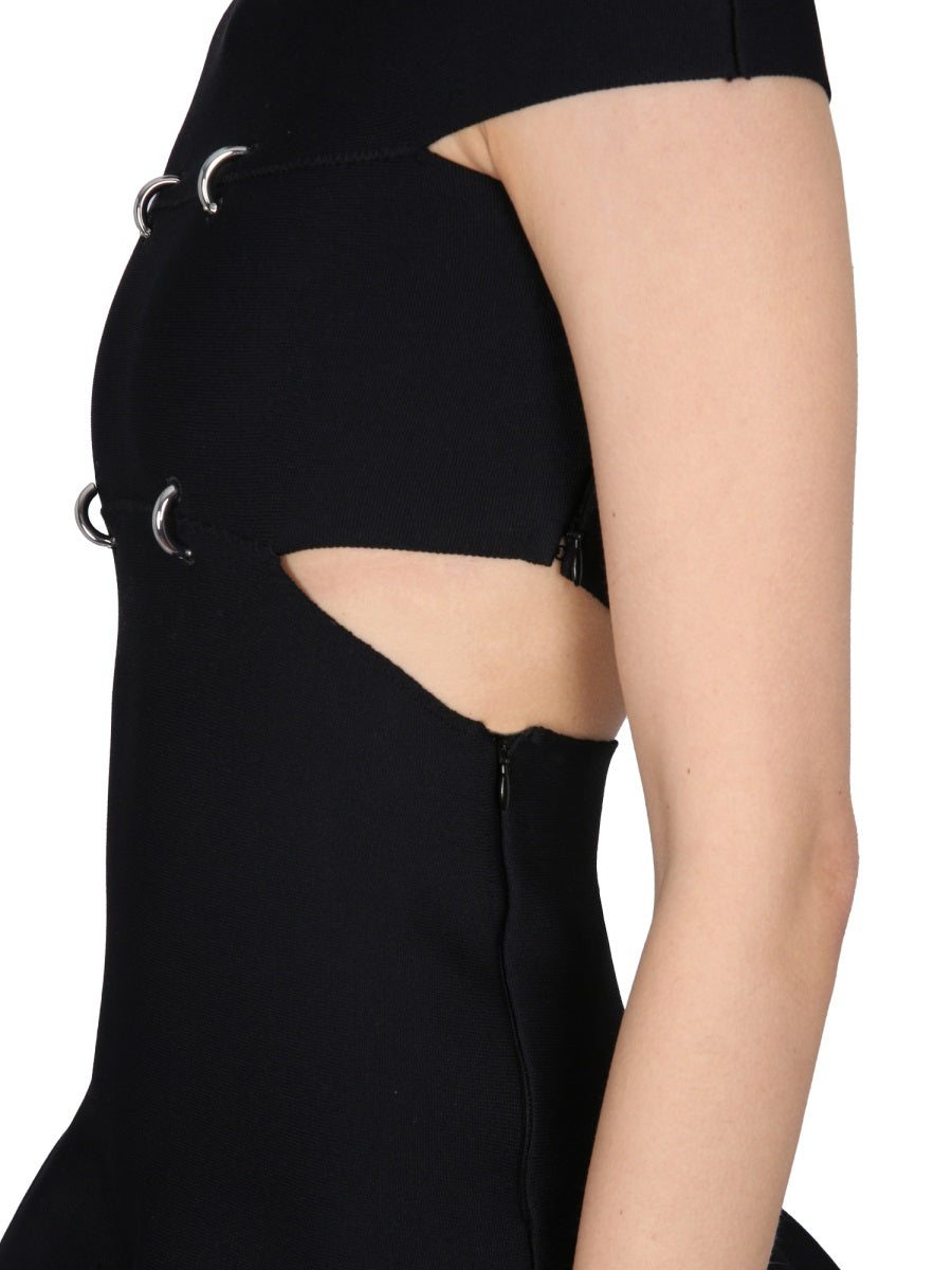 Close-up of Alexander McQueen cocktail dresses hardware and fine stitching