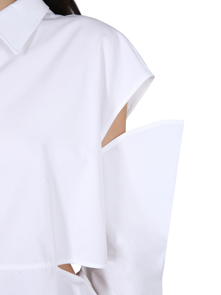 Close-up of Alexander McQueen cocktail dresses hardware and fine stitching