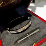 Close-up detail view of Cartier unisex jewelry piece