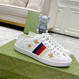 Gucci Luxury sneakers in tonal black classic court silhouette front view