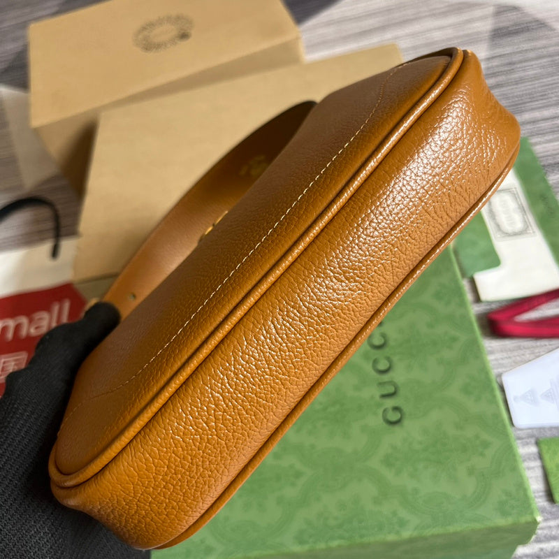 Handle and strap detail of chic everyday-luxe women's handbag – women's designer-style accessory