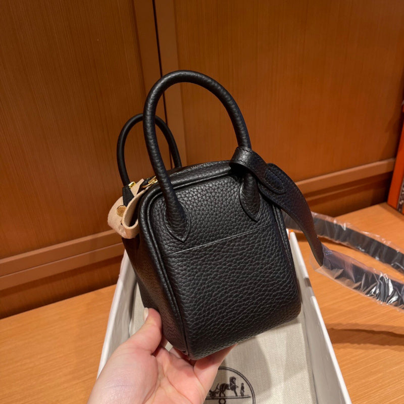 Close-up detail of poised bag design