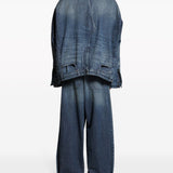 Close-up of Balenciaga outerwear hardware and fine stitching