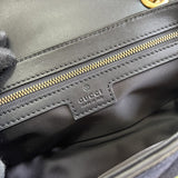 Close-up detail of polished statement women's handbag – women's premium purse