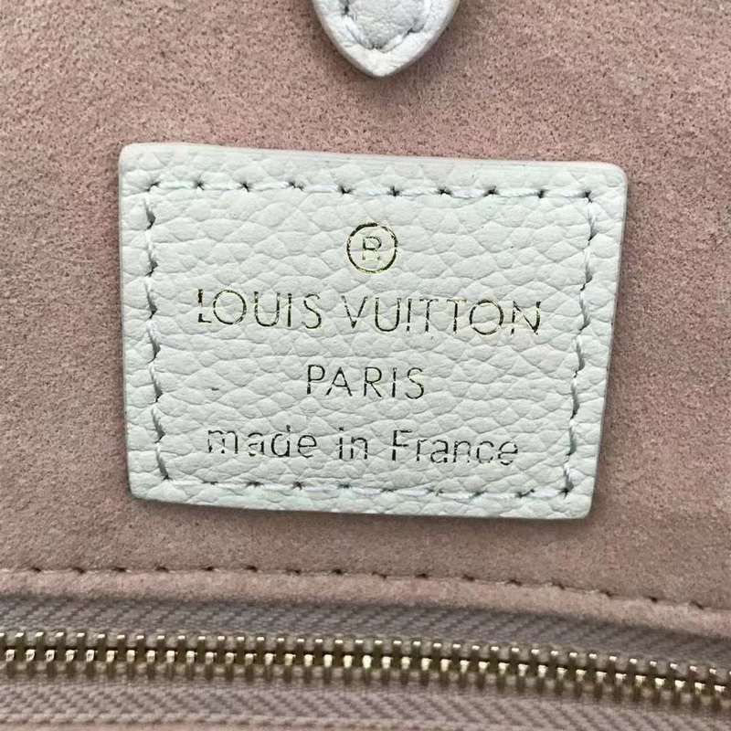Side profile of signature premium women's handbag – women's luxury accessory