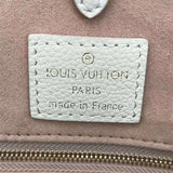 Side profile of signature premium women's handbag – women's luxury accessory
