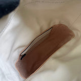 Back view of modern everyday-luxe women's handbag – women's statement bag