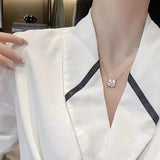Side view of Van Cleef & Arpels unisex jewelry piece