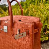 Close-up detail of understated bag design