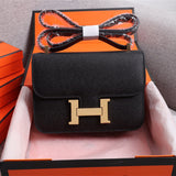 Side view of polished structured handbag